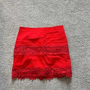 Red mini Jcrew skirt with adorable flower details. Size 2